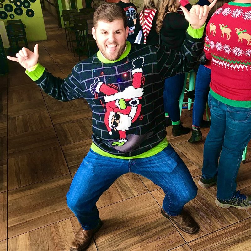 Christmas Pub Crawl Participant Having Fun At Famous Saloon In Nashville