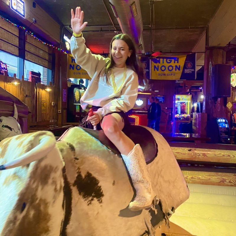 Bachelorette On Nash Bash Tour Riding Bull With One Hand In The Air