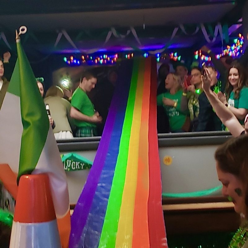 Clover Crawl Participants Playing Rainbow Luge Game