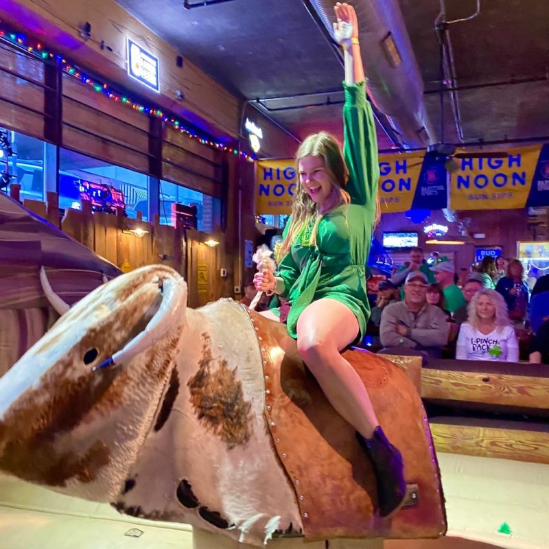 Tour Guest Riding Mechanical Bull On Clover Crawl