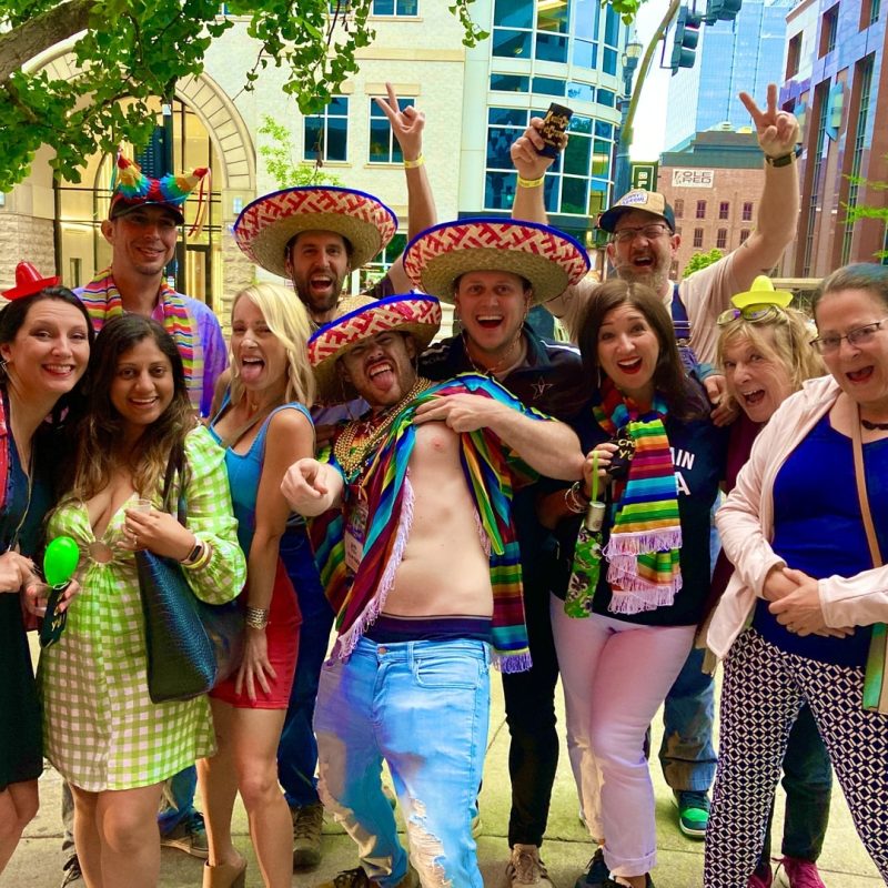 Winning Team On Cinco De Mayo Crawl Showing Off Their Prizes At The End Of The Tour