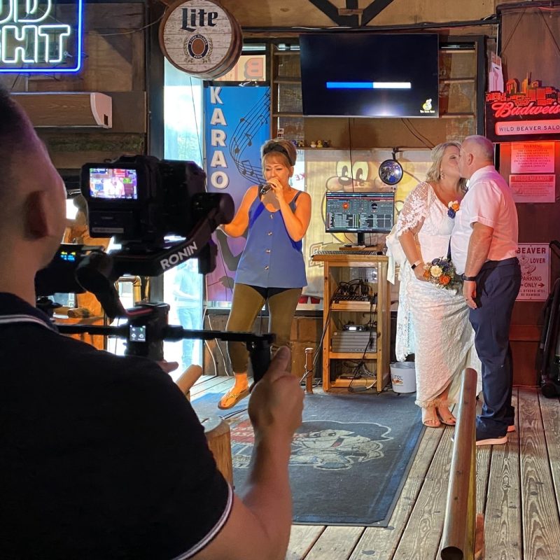 Newlyweds Kissing On Nashville Karaoke Stage