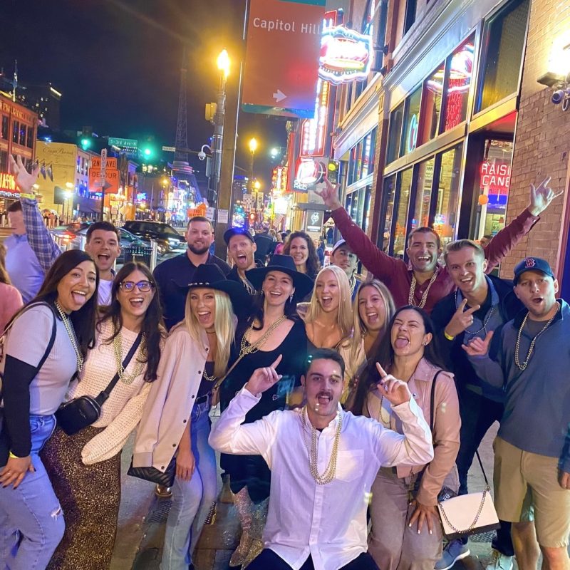 Corporate Bar Crawl Tour Group Having A Blast On Broadway